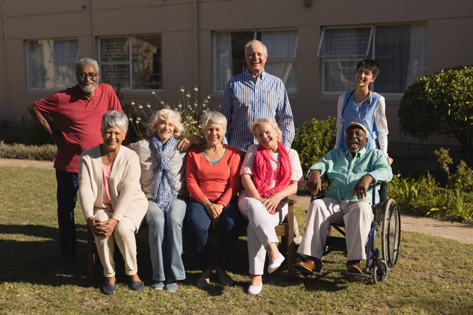 group of elderly persons outside